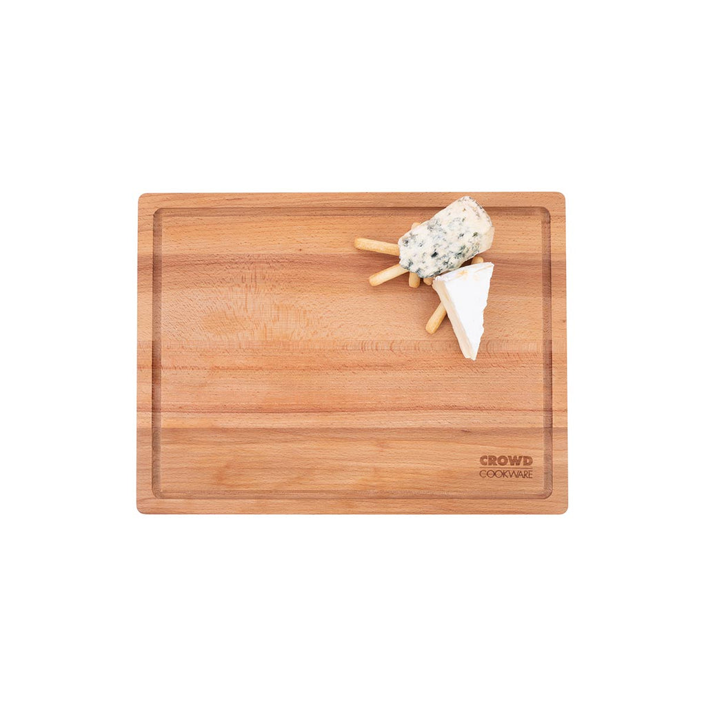 Rectangular Square Beech wood cutting board 40x30 cm with integrated juice groove and cheese on top crowd cookware logo lifestyle image